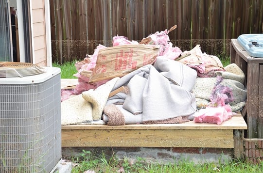 Home carpet and insulation on backyard deck