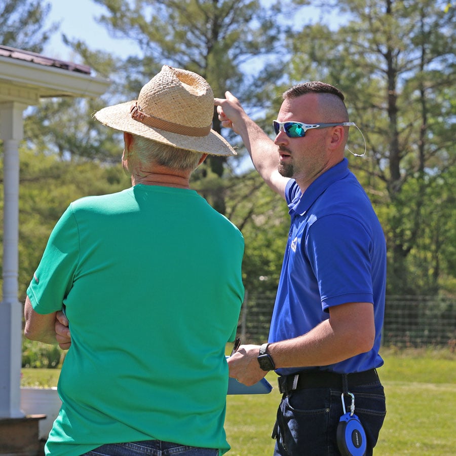 Claims adjuster talking to member