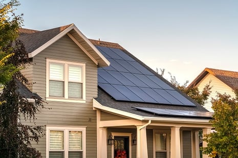 house with solar panels on roof